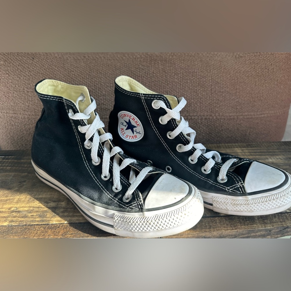 Black high top converse sneakers